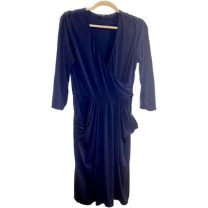 Elegant BCBG navy dress with cleavage